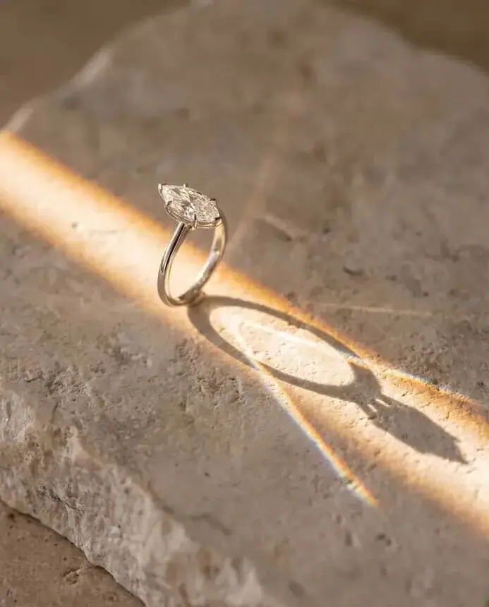 Fine jewellery still life without a shoot: diamond ring on stone in low sun